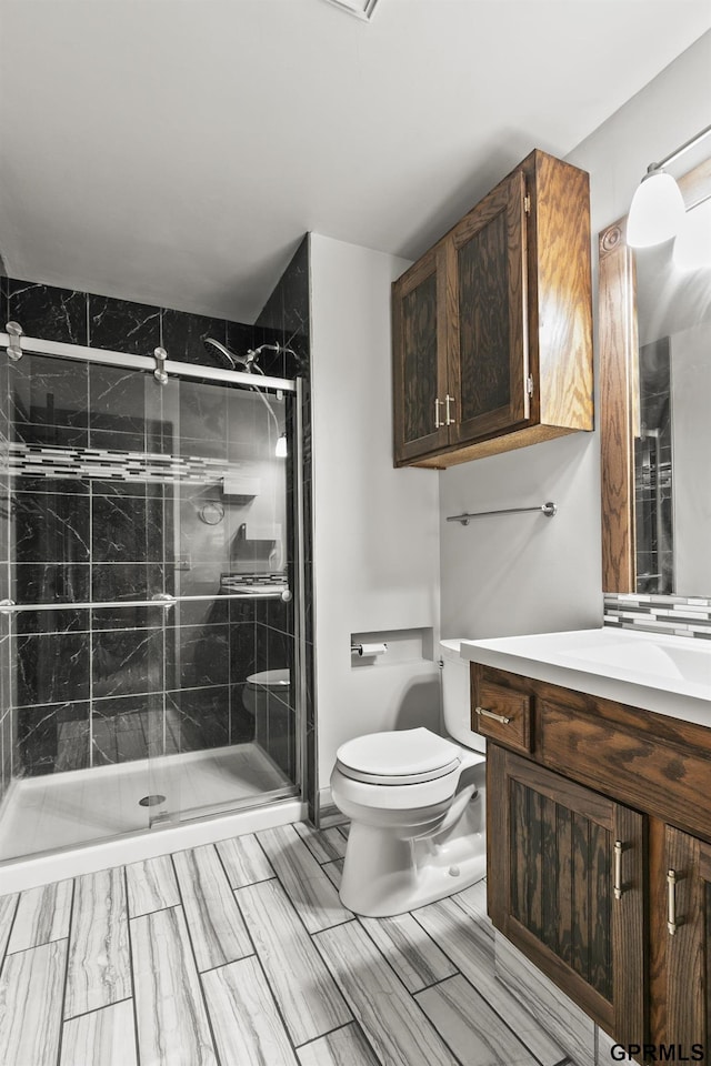 3728 Schuemann Dr, Bellevue, NE 68123 - full bathroom featuring vanity and a shower stall