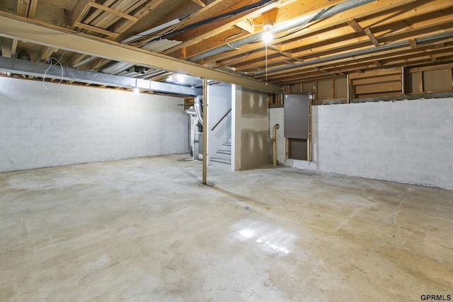 3728 Schuemann Dr, Bellevue, NE 68123 - unfinished below grade area with stairway and concrete block wall