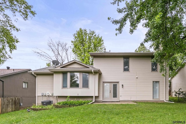 3728 Schuemann Dr, Bellevue, NE 68123 - back of property featuring french doors and a patio