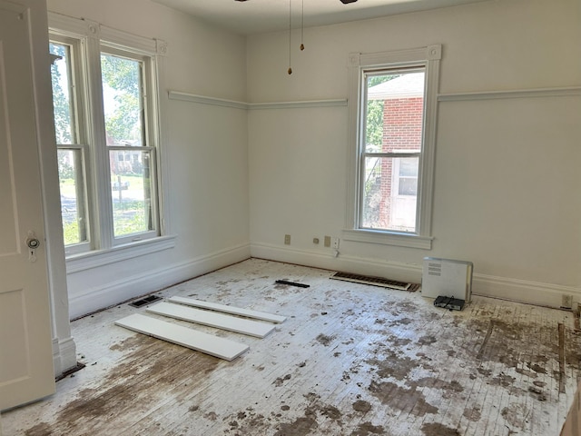 2932 N 50th St, Lincoln, NE 68504 - spare room featuring ceiling fan and baseboards