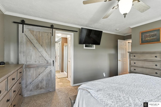 4806 Steavenson Loop, Blair, NE 68008 - bedroom featuring a barn door, light carpet, ornamental molding, ceiling fan, and connected bathroom