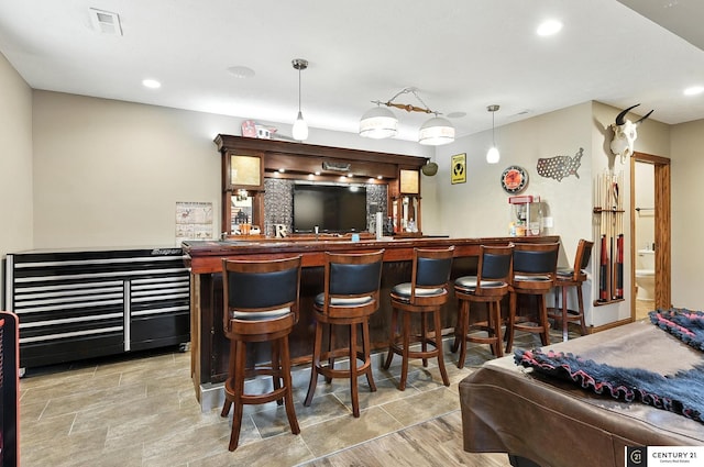 4806 Steavenson Loop, Blair, NE 68008 - indoor bar with recessed lighting and hanging light fixtures