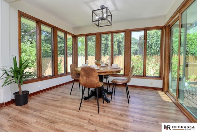 506 Rockhurst Dr, Lincoln, NE 68510 - sunroom / solarium with plenty of natural light and wood finished floors