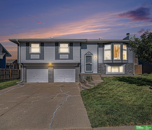 8006 S 154th St, Omaha, NE 68138 - split foyer home featuring a garage and concrete driveway