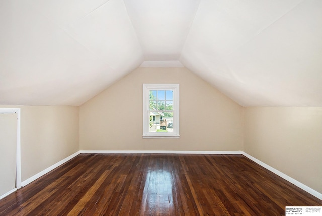 1422 S 52nd St, Omaha, NE 68106 - bonus room featuring dark wood-style flooring and vaulted ceiling