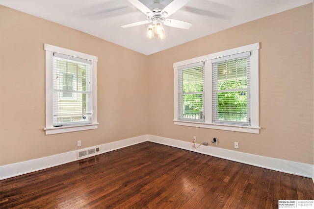1422 S 52nd St, Omaha, NE 68106 - empty room with dark wood-style flooring and a ceiling fan