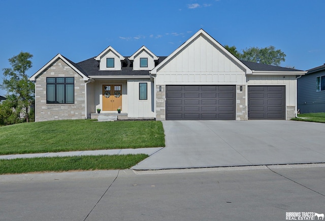 8150 S 185th St, Omaha, NE 68136 - modern farmhouse style home featuring stone siding, board and batten siding, an attached garage, and a front lawn