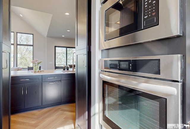 8150 S 185th St, Omaha, NE 68136 - kitchen featuring stainless steel appliances, light countertops, and recessed lighting