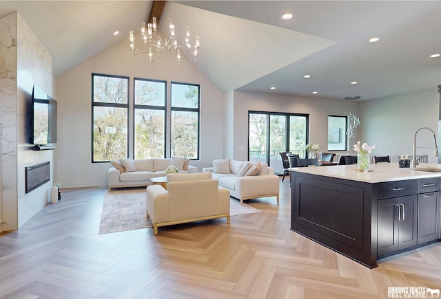 8150 S 185th St, Omaha, NE 68136 - living area featuring a chandelier, recessed lighting, a large fireplace, high vaulted ceiling, and beamed ceiling