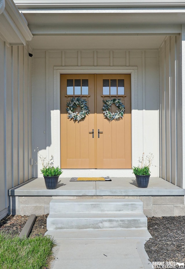 8150 S 185th St, Omaha, NE 68136 - view of exterior entry featuring board and batten siding