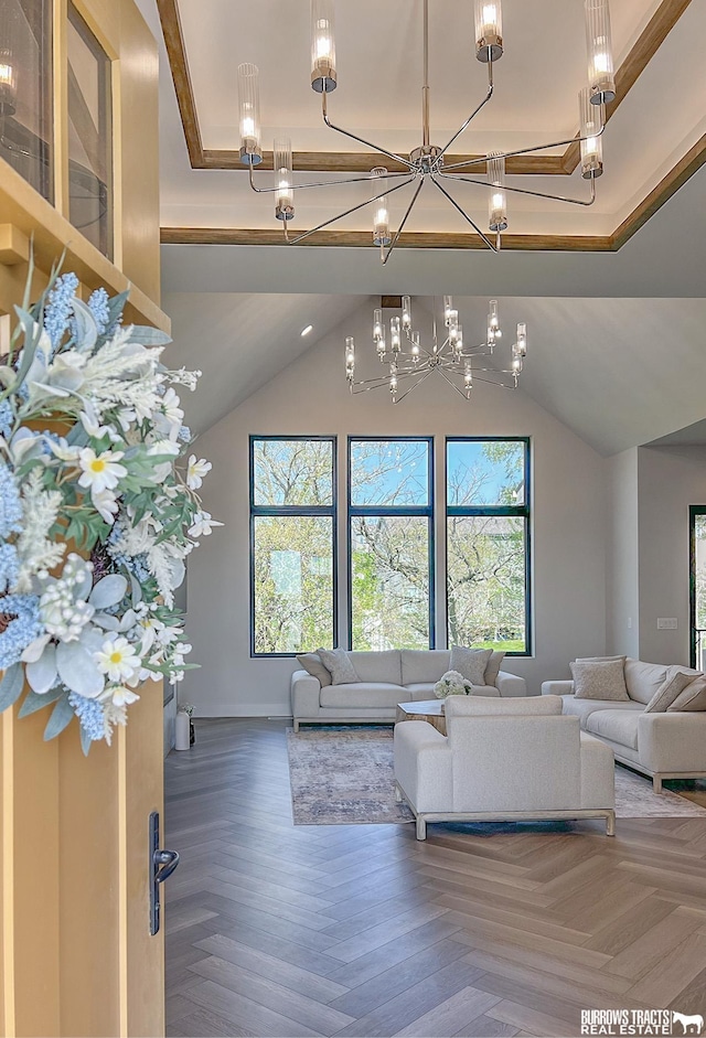 8150 S 185th St, Omaha, NE 68136 - living room with a chandelier, plenty of natural light, and vaulted ceiling