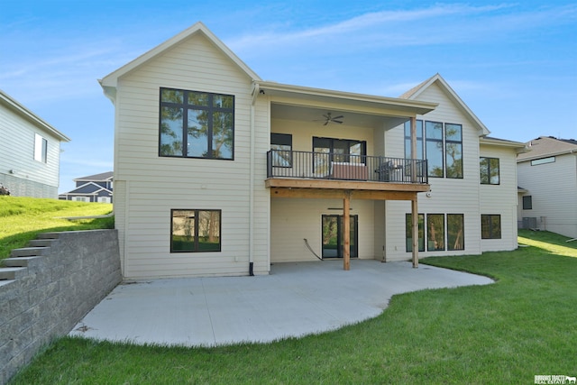 8150 S 185th St, Omaha, NE 68136 - back of property featuring a lawn, a patio, a ceiling fan, and a balcony