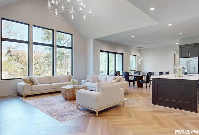 8150 S 185th St, Omaha, NE 68136 - living area with a chandelier, plenty of natural light, recessed lighting, and a towering ceiling