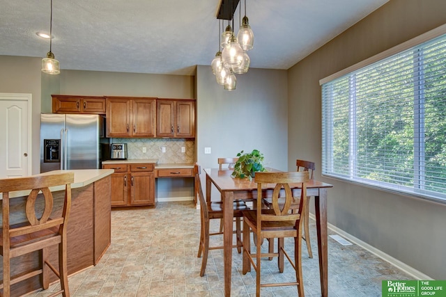 1608 Old Gaelic St, Bellevue, NE 68123 - dining room featuring baseboards
