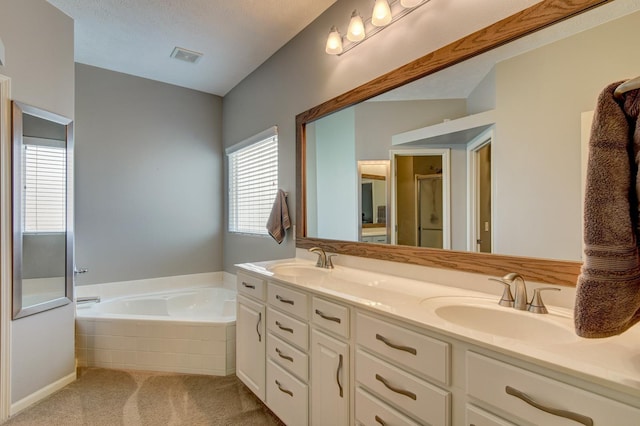 1608 Old Gaelic St, Bellevue, NE 68123 - full bath featuring a bath, double vanity, and a stall shower