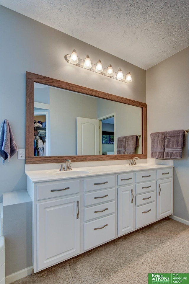 1608 Old Gaelic St, Bellevue, NE 68123 - full bath featuring double vanity and a textured ceiling