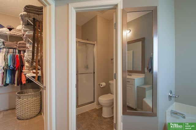 1608 Old Gaelic St, Bellevue, NE 68123 - full bath with a stall shower, a walk in closet, and vanity