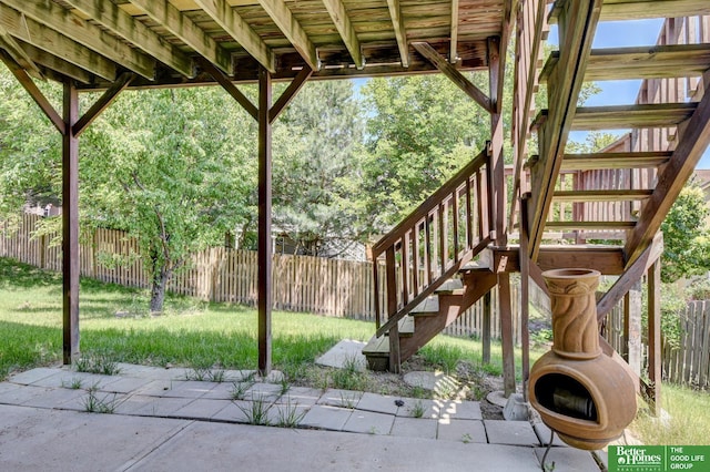 1608 Old Gaelic St, Bellevue, NE 68123 - fenced backyard featuring stairway and a patio area