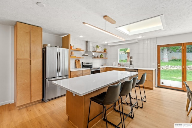 1133 S 96th St, Omaha, NE 68124 - kitchen with stainless steel appliances, wall chimney exhaust hood, open shelves, tasteful backsplash, and a textured ceiling