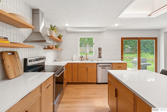 1133 S 96th St, Omaha, NE 68124 - kitchen featuring open shelves, island range hood, appliances with stainless steel finishes, light wood-type flooring, and decorative backsplash