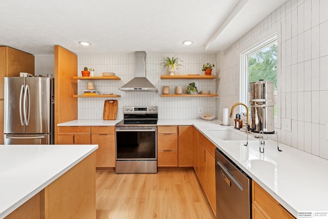 1133 S 96th St, Omaha, NE 68124 - kitchen featuring appliances with stainless steel finishes, wall chimney range hood, open shelves, light wood-style flooring, and recessed lighting