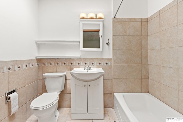 1133 S 96th St, Omaha, NE 68124 - bathroom with tile walls, vanity, wainscoting, tile patterned flooring, and shower / washtub combination
