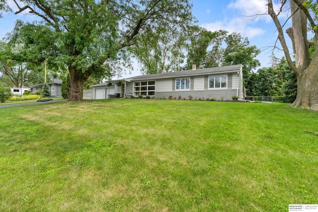 1133 S 96th St, Omaha, NE 68124 - ranch-style house with a garage, a front lawn, and a chimney