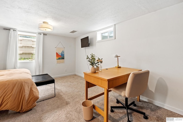 1133 S 96th St, Omaha, NE 68124 - carpeted bedroom featuring a textured ceiling and a desk