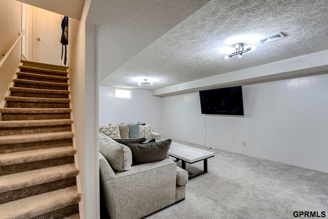 4509 Ridgeway Rd, Omaha, NE 68134 - carpeted living room featuring a textured ceiling and stairs