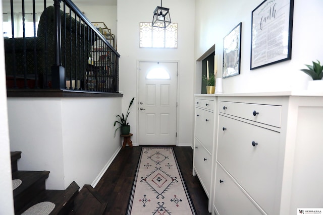 13719 S 43rd Ave, Bellevue, NE 68123 - foyer entrance with stairs and dark wood finished floors
