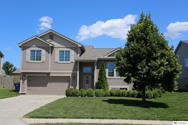 13719 S 43rd Ave, Bellevue, NE 68123 - view of front of house featuring an attached garage and driveway