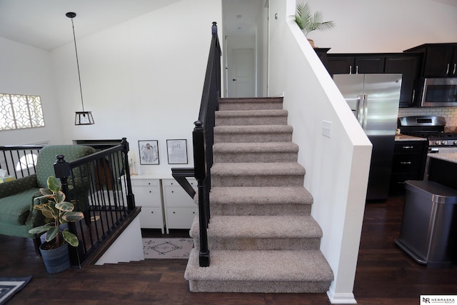 13719 S 43rd Ave, Bellevue, NE 68123 - stairway featuring wood finished floors and vaulted ceiling
