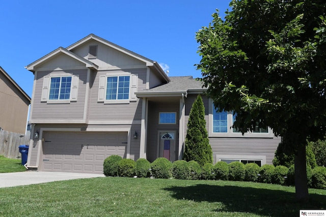 13719 S 43rd Ave, Bellevue, NE 68123 - view of front of property featuring a garage and concrete driveway