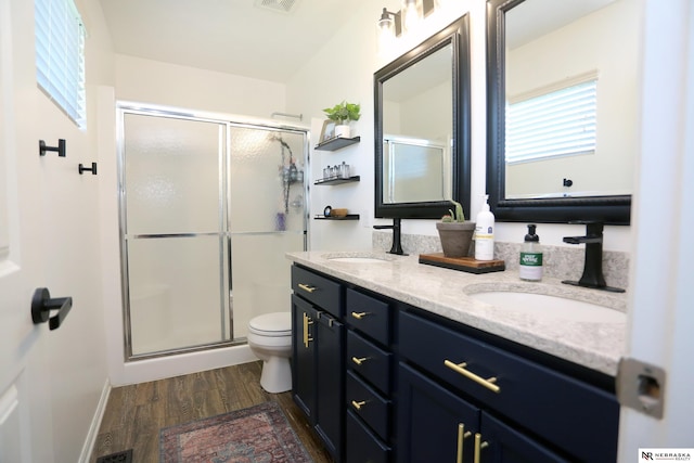 13719 S 43rd Ave, Bellevue, NE 68123 - full bath featuring double vanity, wood finished floors, and a stall shower