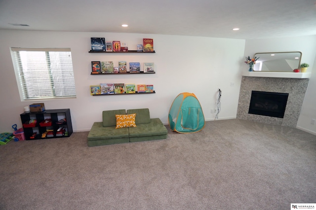 13719 S 43rd Ave, Bellevue, NE 68123 - carpeted living room featuring a fireplace and recessed lighting