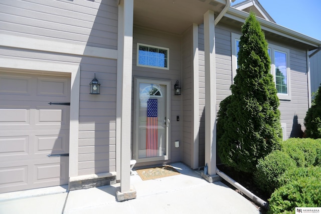 13719 S 43rd Ave, Bellevue, NE 68123 - entrance to property featuring a garage