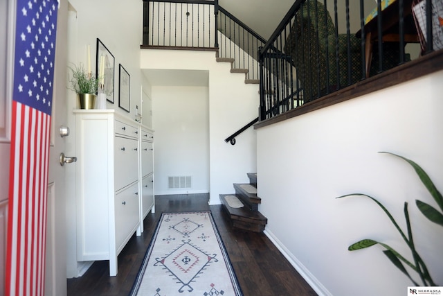 13719 S 43rd Ave, Bellevue, NE 68123 - entrance foyer featuring stairs and dark wood-style flooring