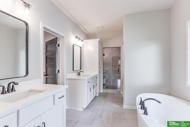 5425 N 212th St, Elkhorn, NE 68022 - full bathroom with a stall shower, two vanities, tile patterned flooring, and a soaking tub
