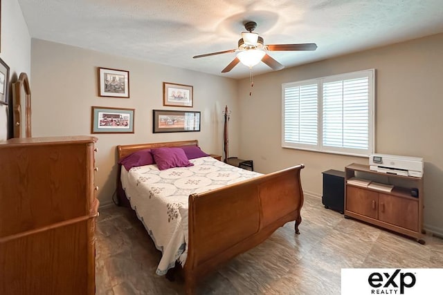 2611 N 189th St, Elkhorn, NE 68022 - bedroom featuring a ceiling fan and baseboards