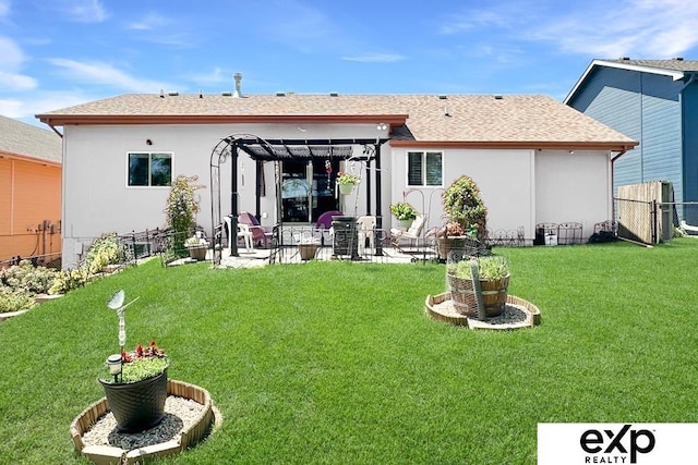 2611 N 189th St, Elkhorn, NE 68022 - back of house with a patio, roof with shingles, and stucco siding