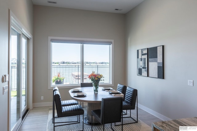 6217 N 295th St, Valley, NE 68064 - dining room featuring light wood-style floors and healthy amount of natural light