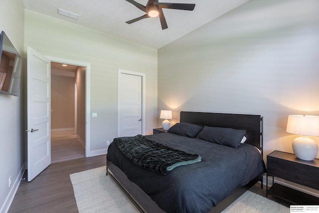 6217 N 295th St, Valley, NE 68064 - bedroom with wood finished floors, vaulted ceiling, and ceiling fan