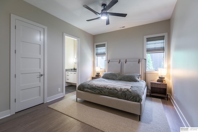 6217 N 295th St, Valley, NE 68064 - bedroom with wood finished floors, multiple windows, ensuite bathroom, and ceiling fan