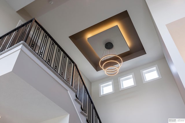 6217 N 295th St, Valley, NE 68064 - detailed view of a chandelier, a raised ceiling, and a smoke detector