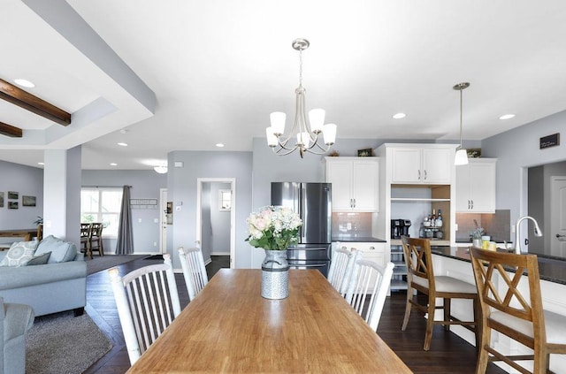 13510 S 46th St, Papillion, NE 68133 - dining area with dark wood-style floors, a chandelier, and recessed lighting