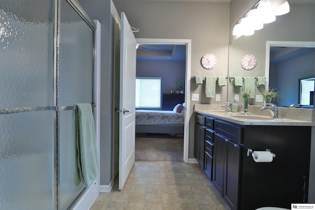 17457 Ames Ave, Omaha, NE 68116 - bathroom with ensuite bath, a shower stall, and double vanity