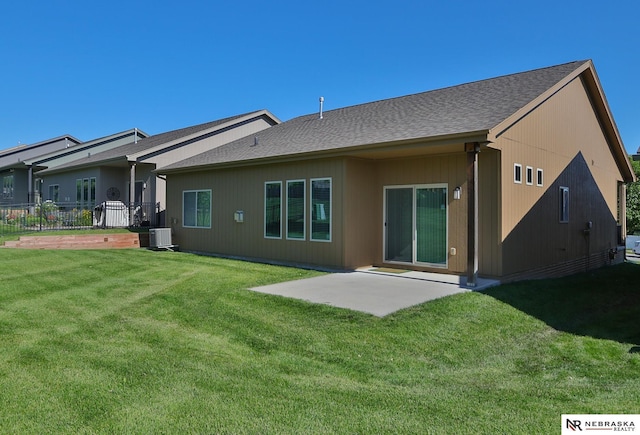 17457 Ames Ave, Omaha, NE 68116 - back of house with a patio area and a shingled roof