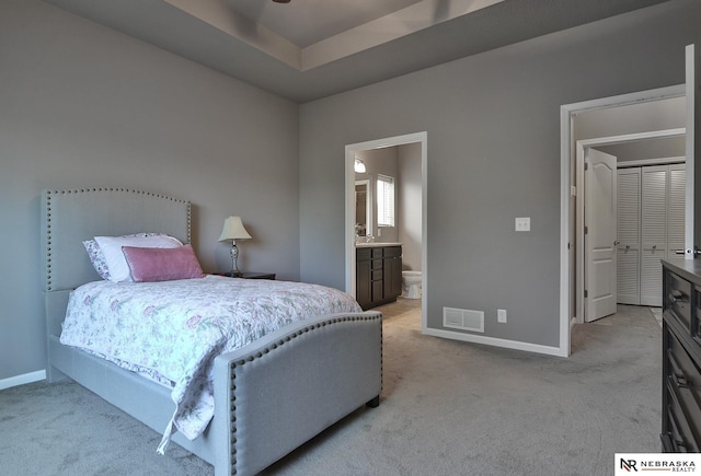 17457 Ames Ave, Omaha, NE 68116 - carpeted bedroom with baseboards and connected bathroom