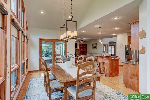 19311 Josephine St, Gretna, NE 68028 - dining area with light wood-style floors, plenty of natural light, a ceiling fan, recessed lighting, and lofted ceiling
