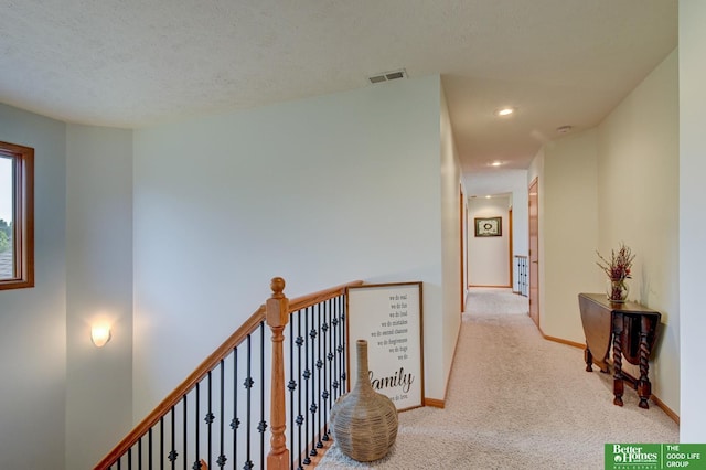 19311 Josephine St, Gretna, NE 68028 - hall with carpet floors, recessed lighting, and an upstairs landing